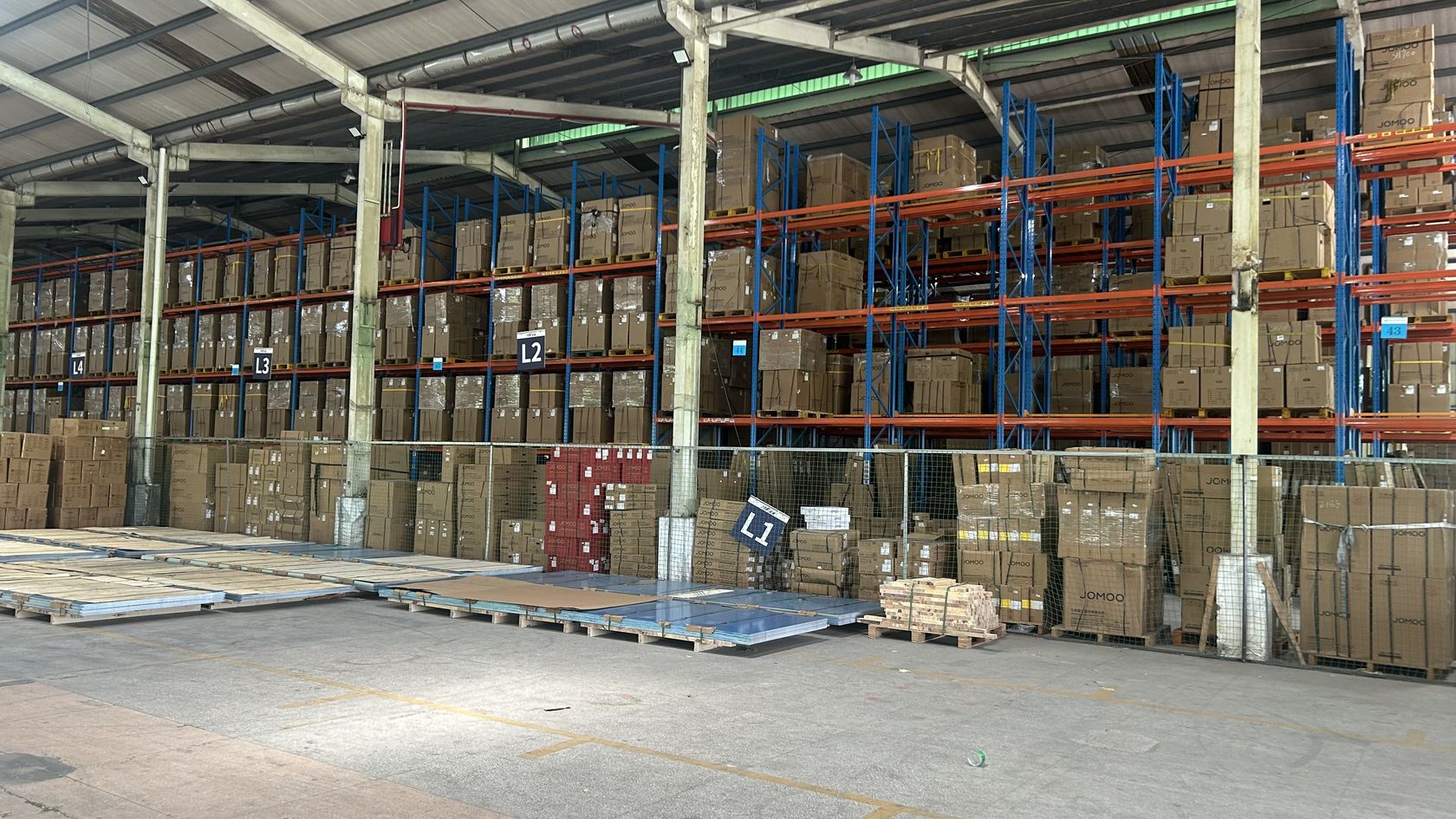 Zone-labeled racking aisle
